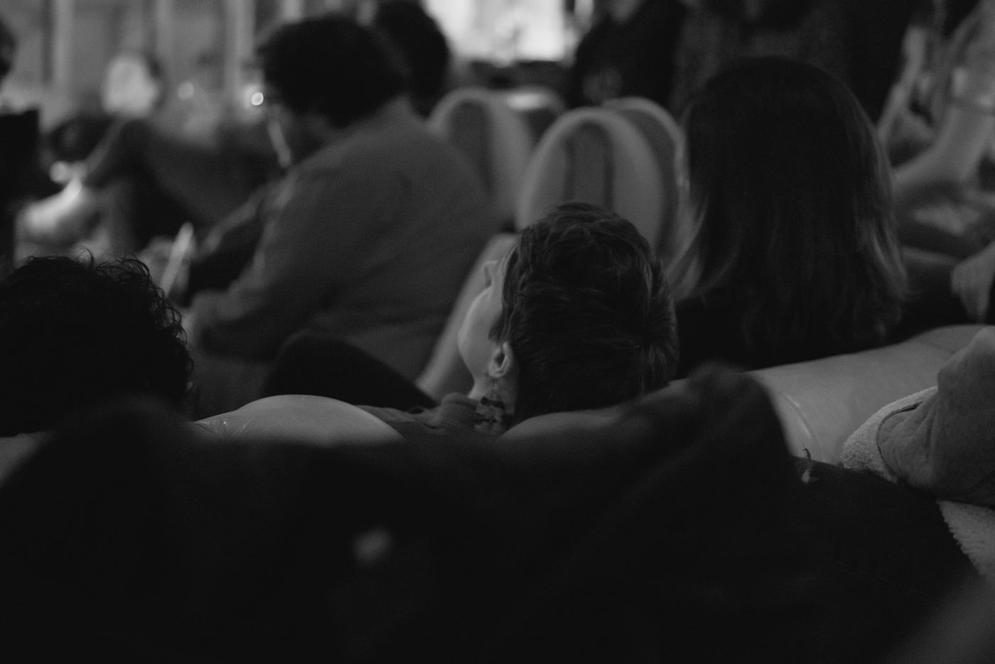 A concert goer enjoys the nights Sing For Your Slumber performance at Tourists.